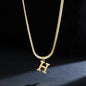 A gold-plated, stainless steel necklace, with the initials from A to Z.